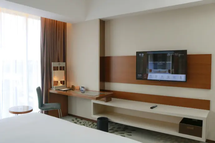 Télévision intégrée dans les chambres d'hôtel